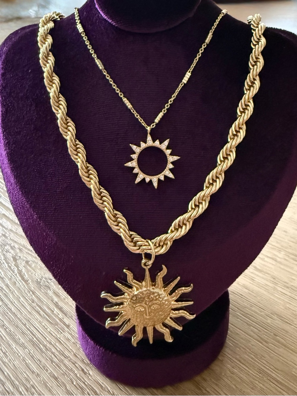 Gold colored set of 2 sun necklaces